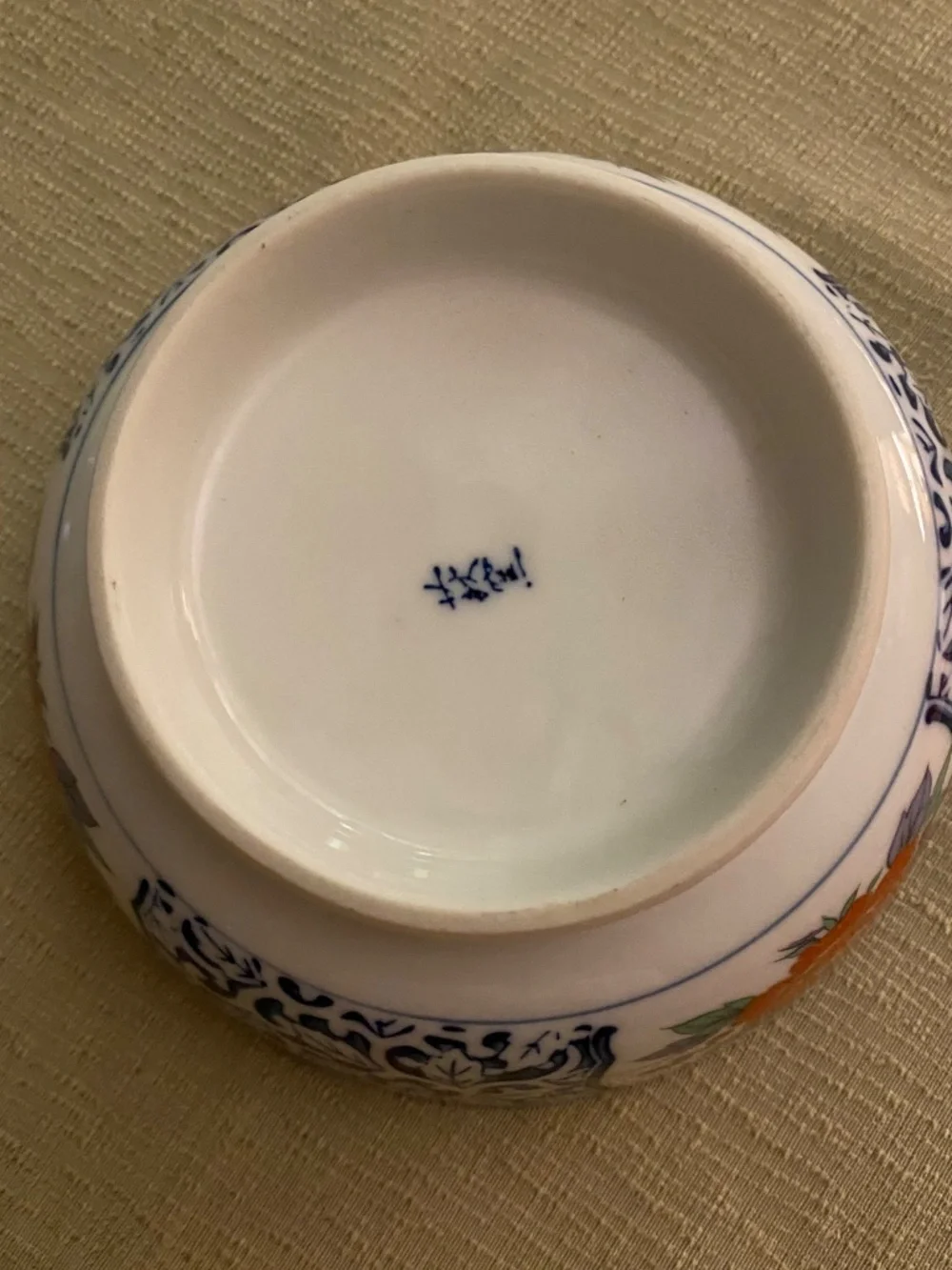 Japanese porcelain bowl beautiful floral with scalloped rim.